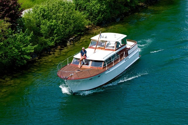 Yacht traveling in the river