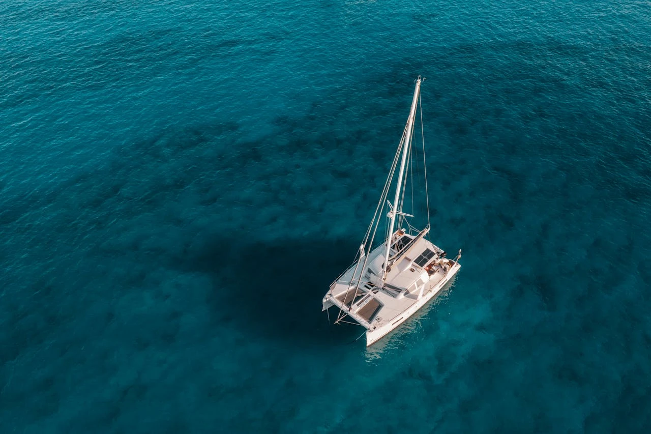 Catamaran yacht anchored at sea level