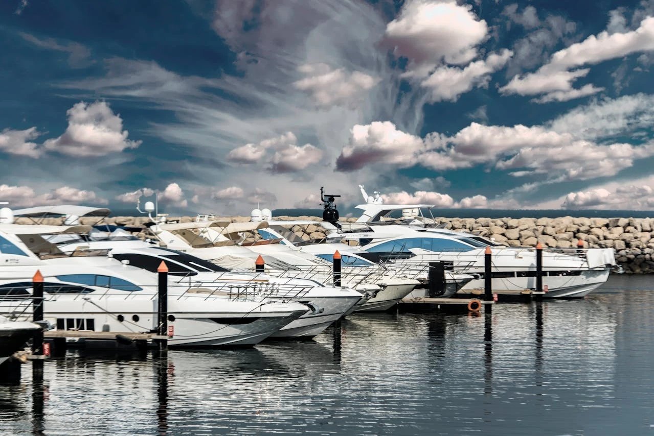 Multiple yachts docked at the marina