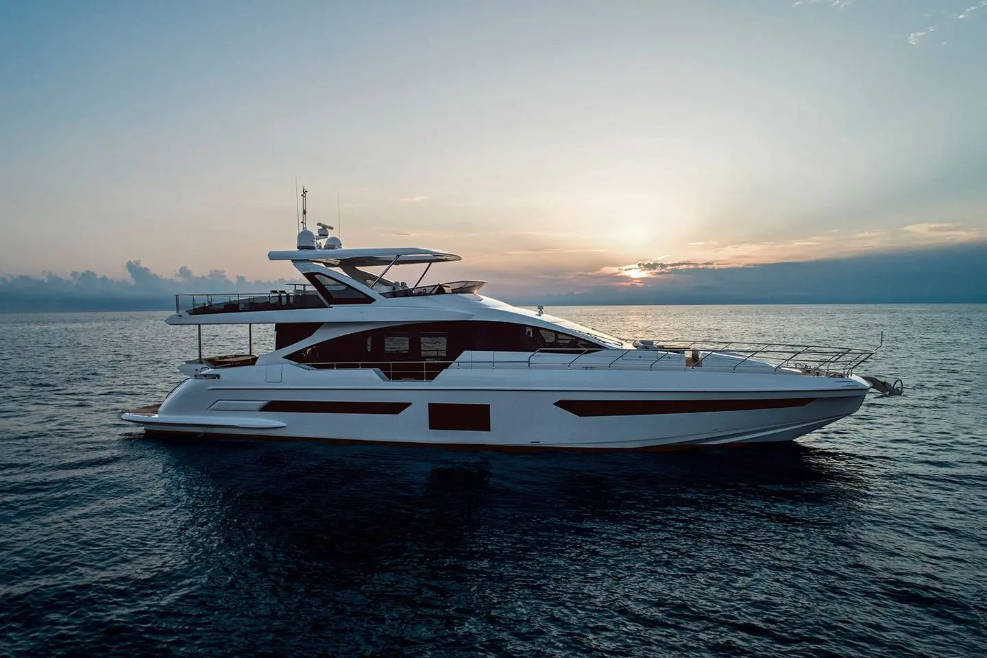 Luxury yachts for sale cruising at sea