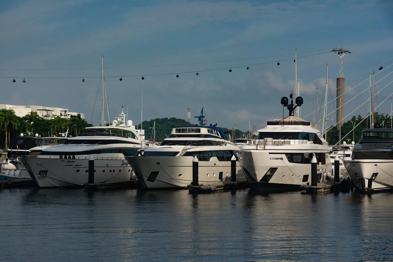 Yachts moored at a marine dock