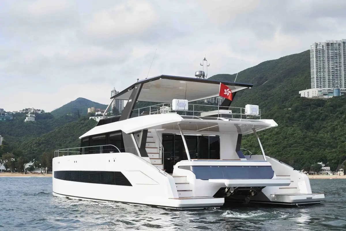 A Catamaran Sailing at Sea