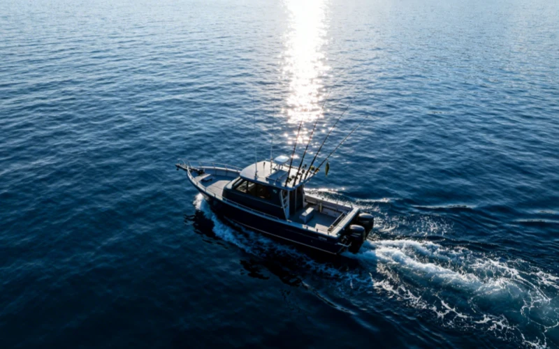 A Fishing Boat Sailing at Sea